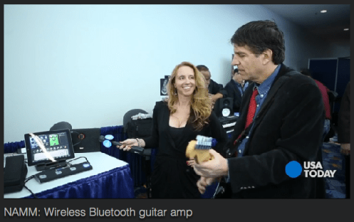 Starr Ackerman and Jefferson Graham from USA Today showing off iLoud bluetooth speaker system.